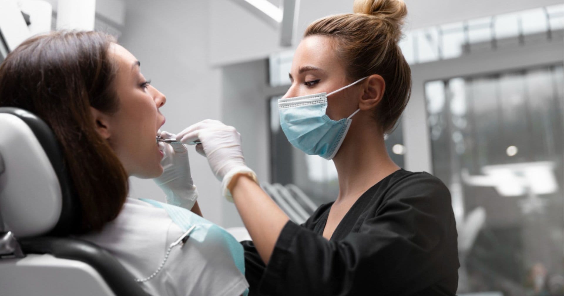Dentist assessing the cause of persistent bad breath in Cheltenham